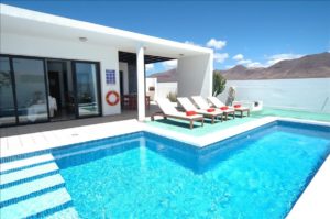 Relax round the pool on your Lanzarote holiday